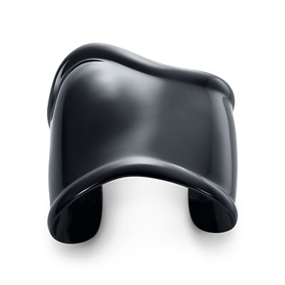 Elsa Peretti® black Bone cuff, medium, left wrist.