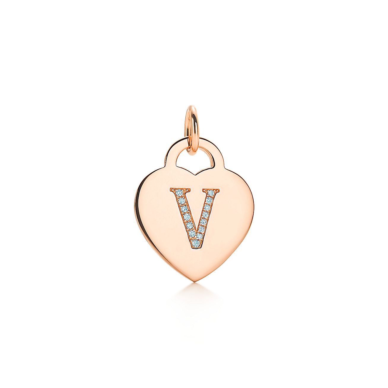 Alphabet heart tag letter "V" charm in 18k rose gold. Letters AZ