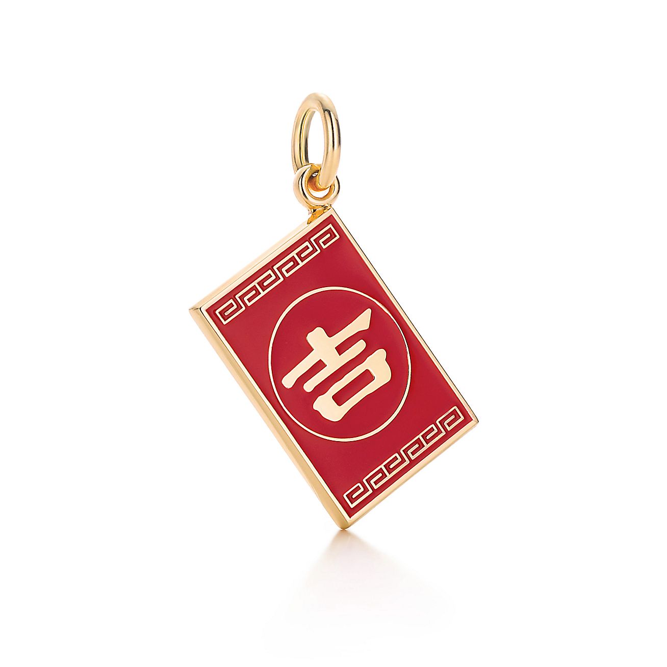 Chinese "Luck" charm in 18k gold with red enamel finish. Tiffany & Co.
