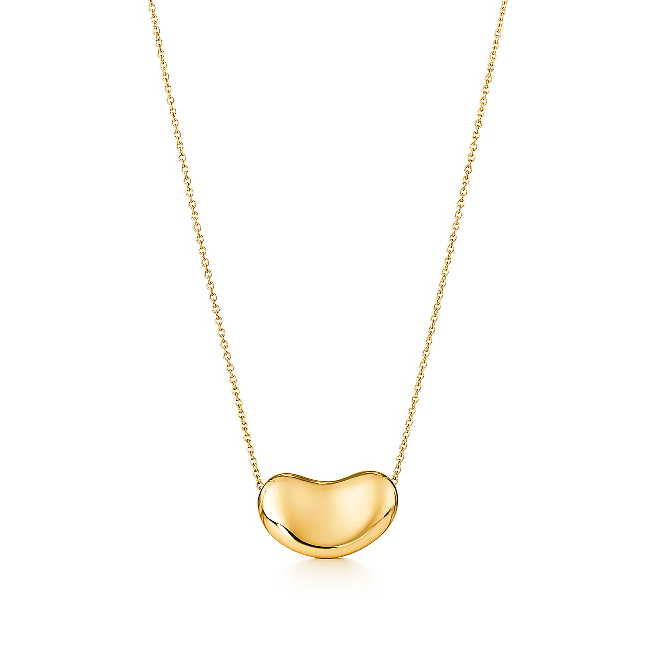 Elsa Peretti® Bean® pendant in 18k gold. Tiffany & Co.