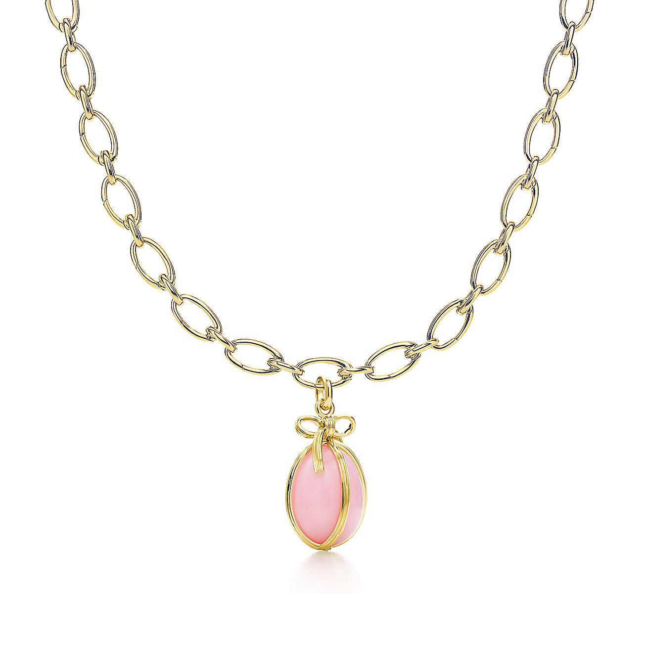 Jean Schlumberger Egg charm in 18k gold with pink opal on a necklace