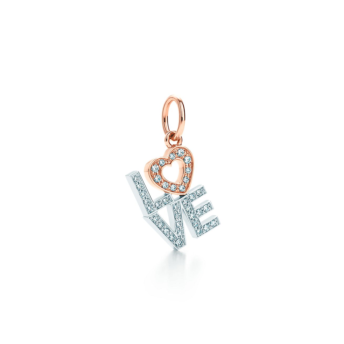 Love charm in 18k white and rose gold with diamonds. Tiffany & Co.