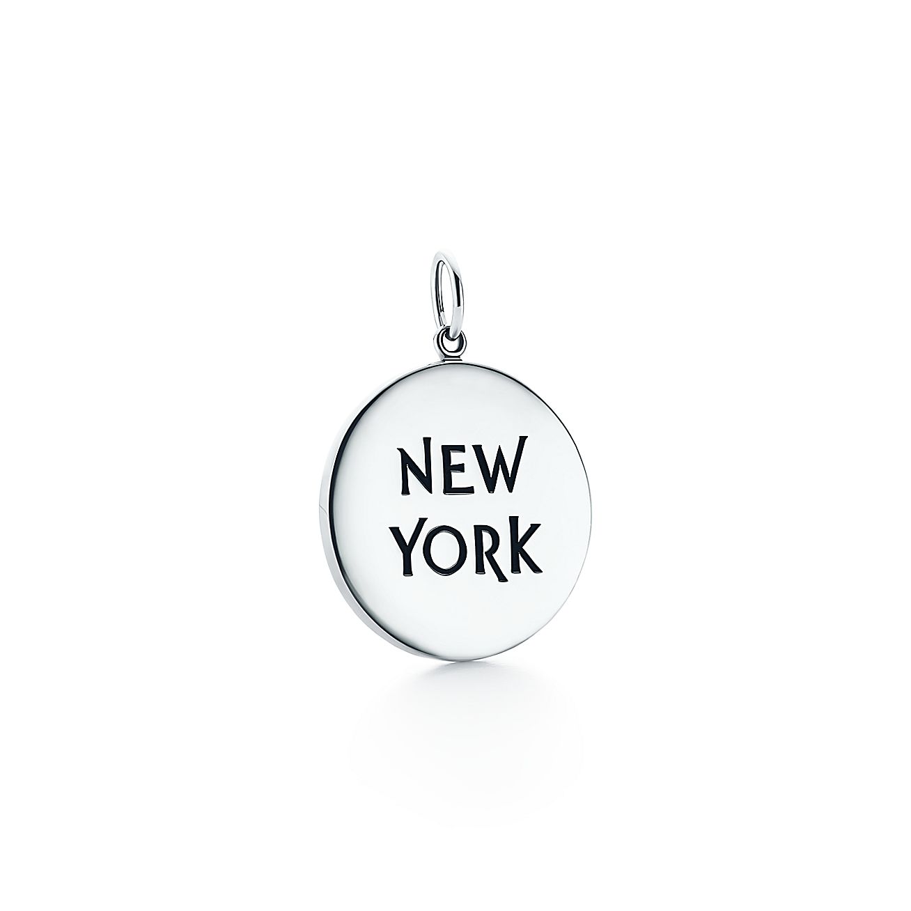 New York round tag charm in sterling silver. Tiffany & Co.