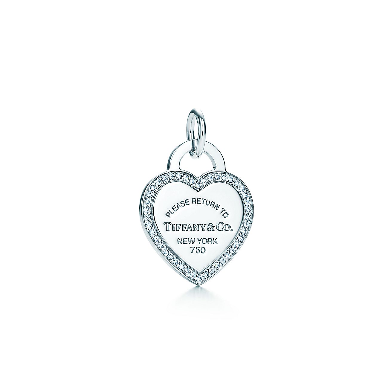 Return to Tiffany® heart tag charm in 18k white gold and diamonds. Tiffany & Co.