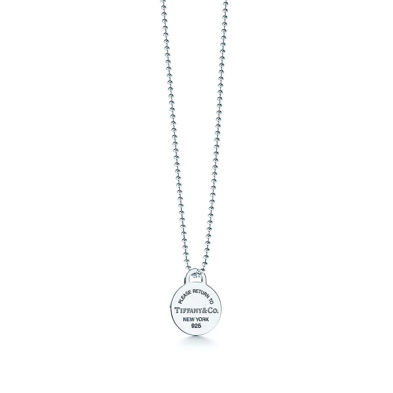 Return to Tiffany® round tag pendant in sterling silver. Tiffany & Co.