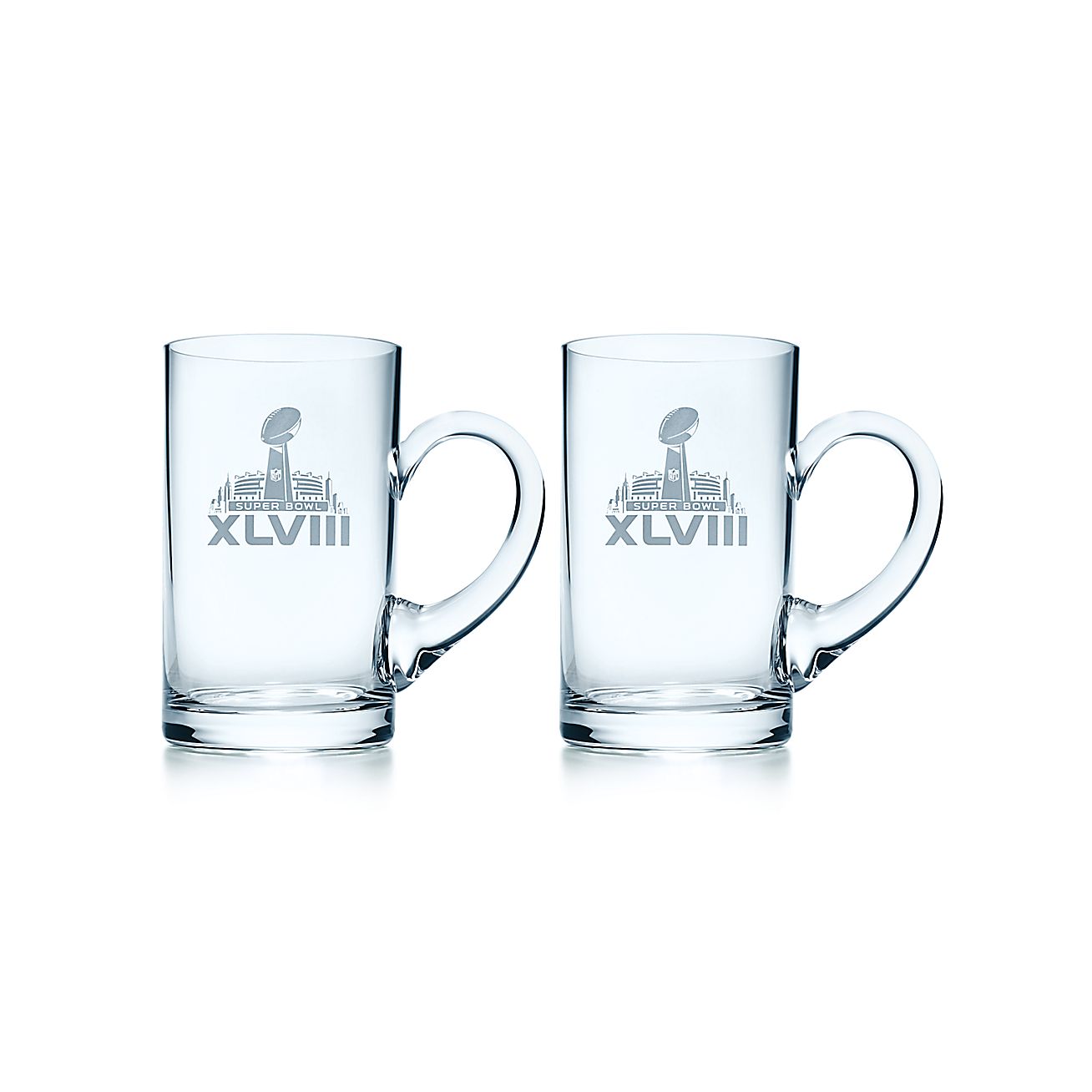 Super Bowl XLVIII beer mugs in crystal, set of two. Tiffany & Co.