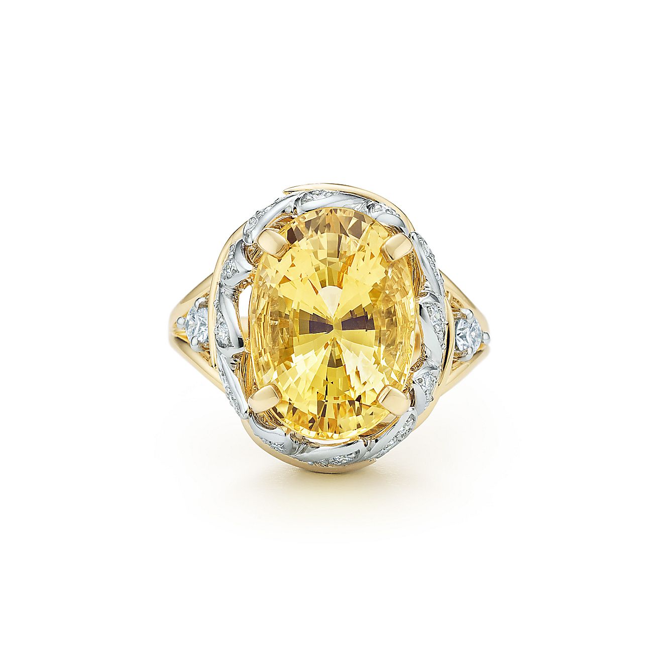 Schlumberger Leaf wrap ring with an unenhanced yellow sapphire in 18k gold. Tiffany & Co.