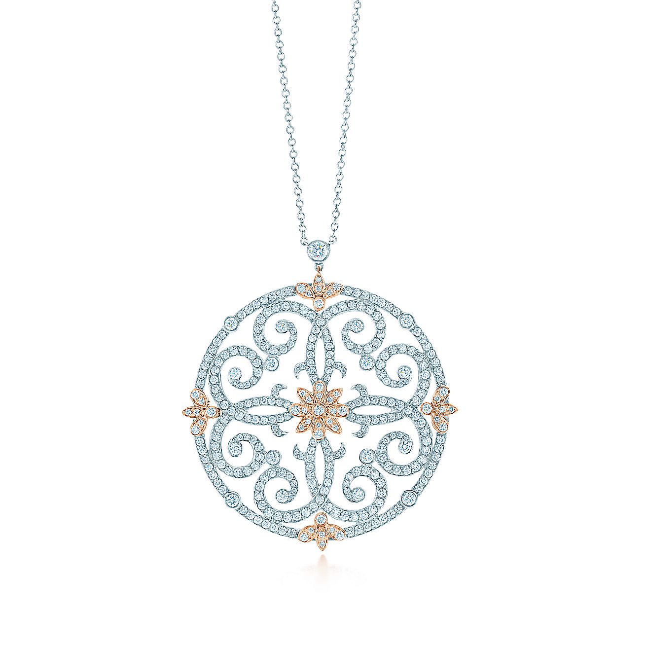 Tiffany Enchant® scroll pendant in platinum and rose gold with diamonds