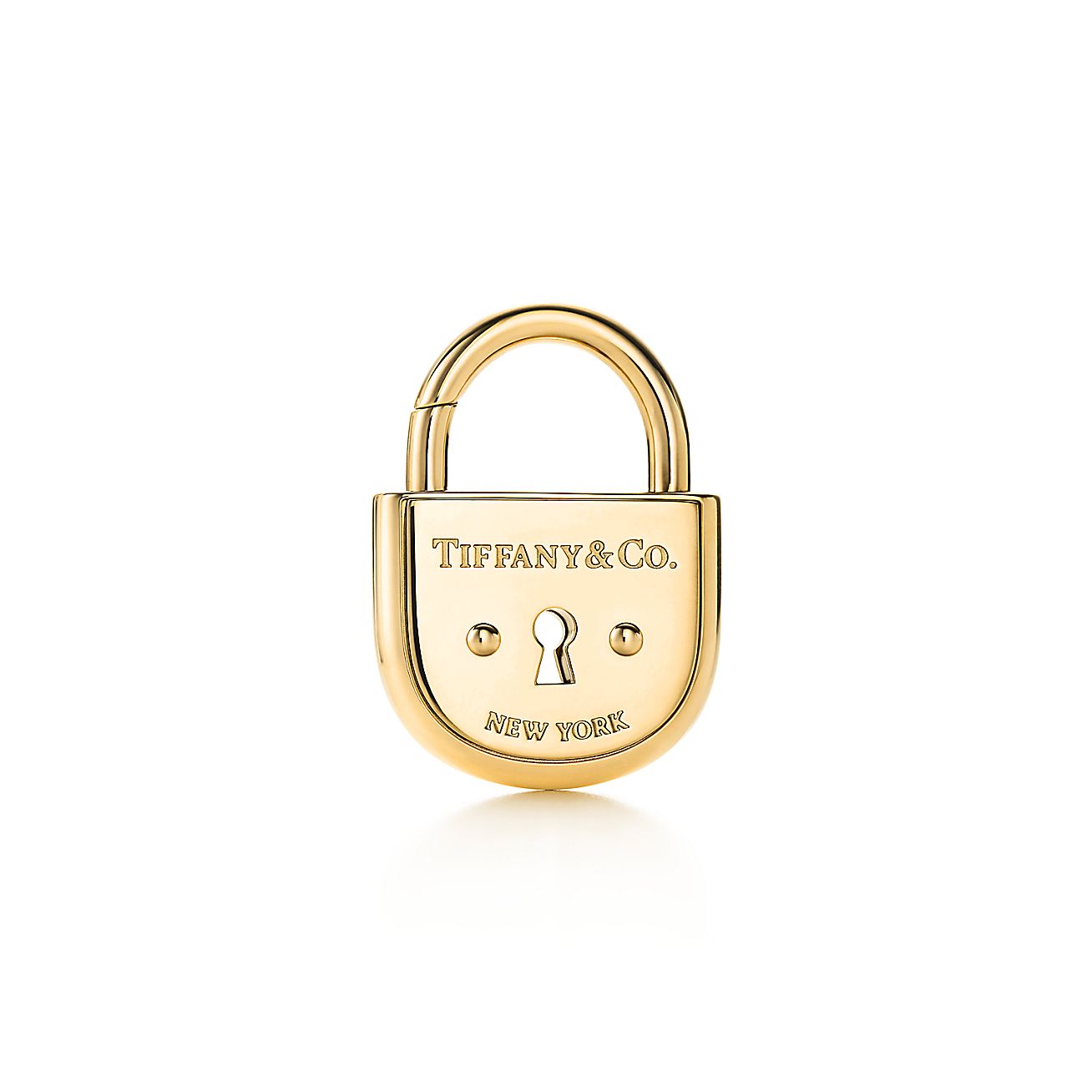 Tiffany Locks arc lock in 18k gold, medium. Tiffany & Co.