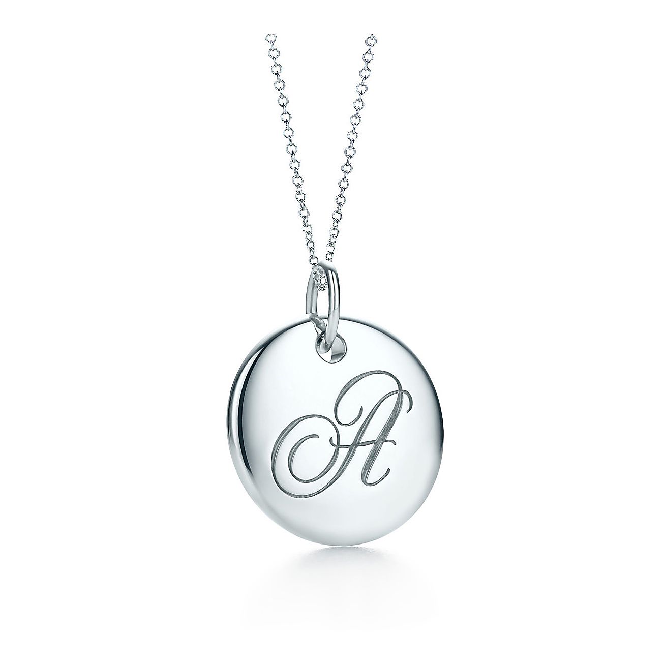 Tiffany Notes alphabet disc charm in silver on a chain. Letters A-Z available. | Tiffany & Co.