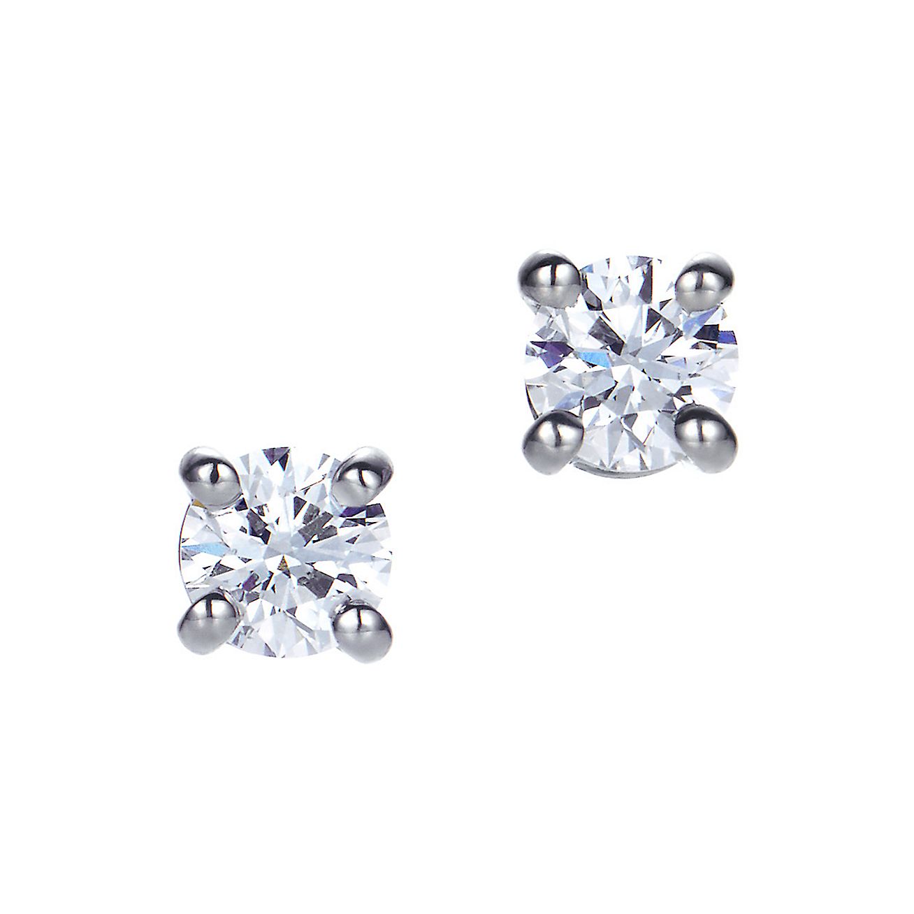 Tiffany solitaire diamond earrings in platinum. Tiffany & Co.
