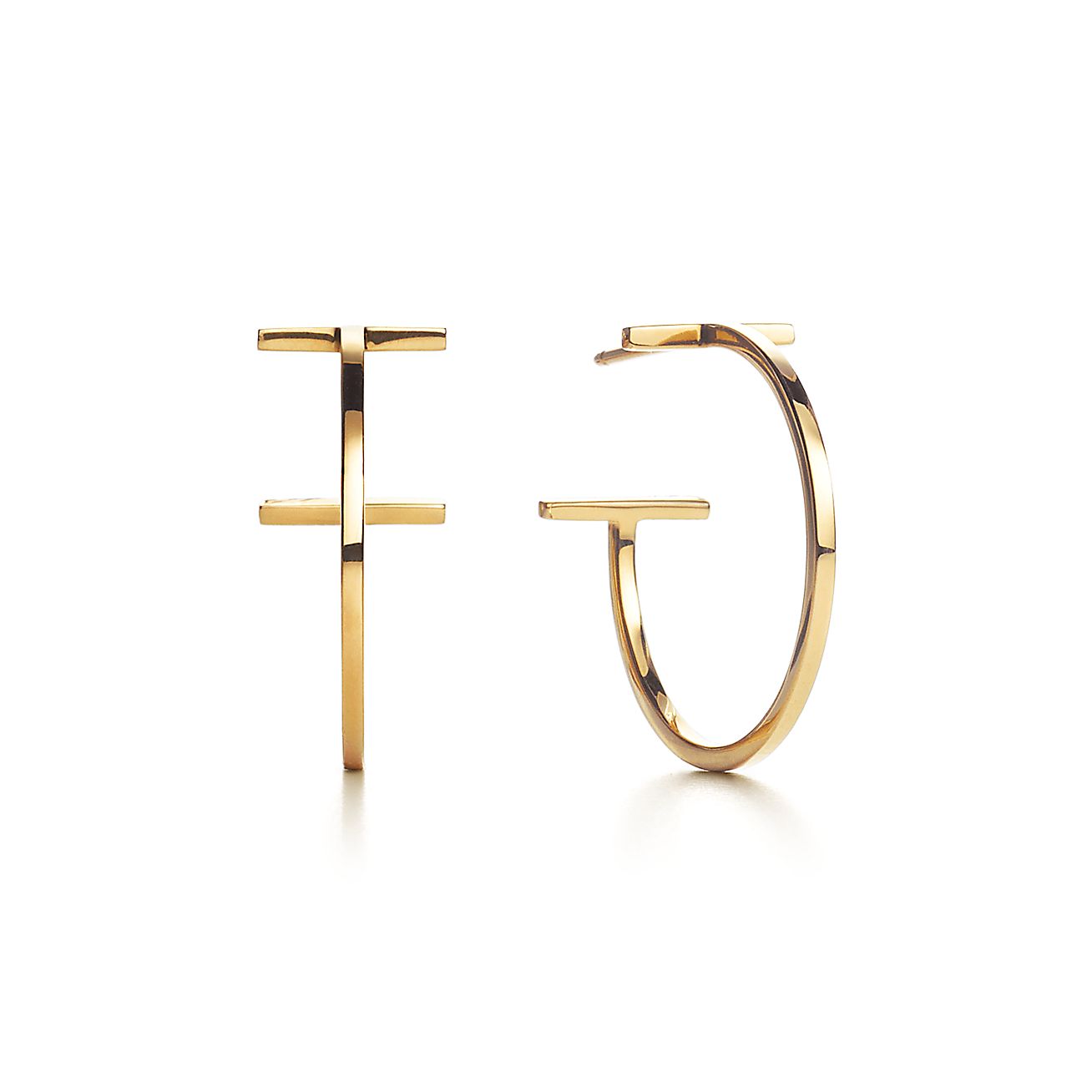 Tiffany T wire hoop earrings in 18k gold, medium. Tiffany & Co.