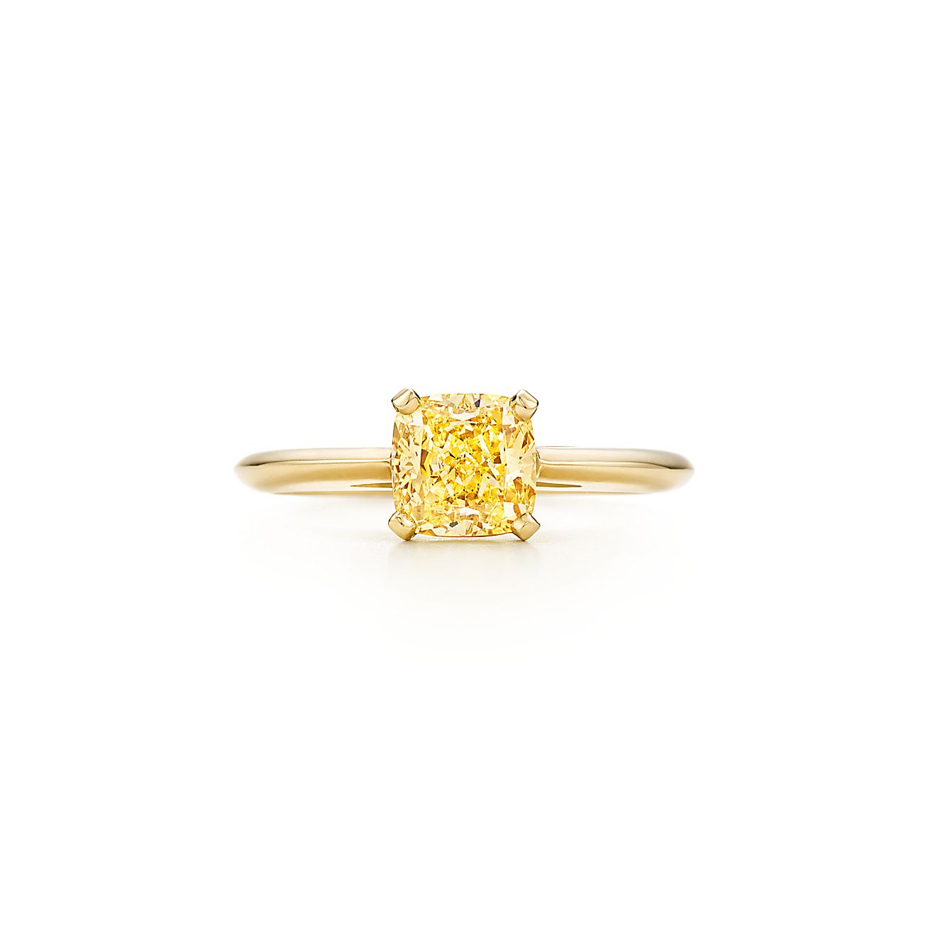 Ring in 18k gold with a cushioncut yellow diamond. Tiffany & Co.