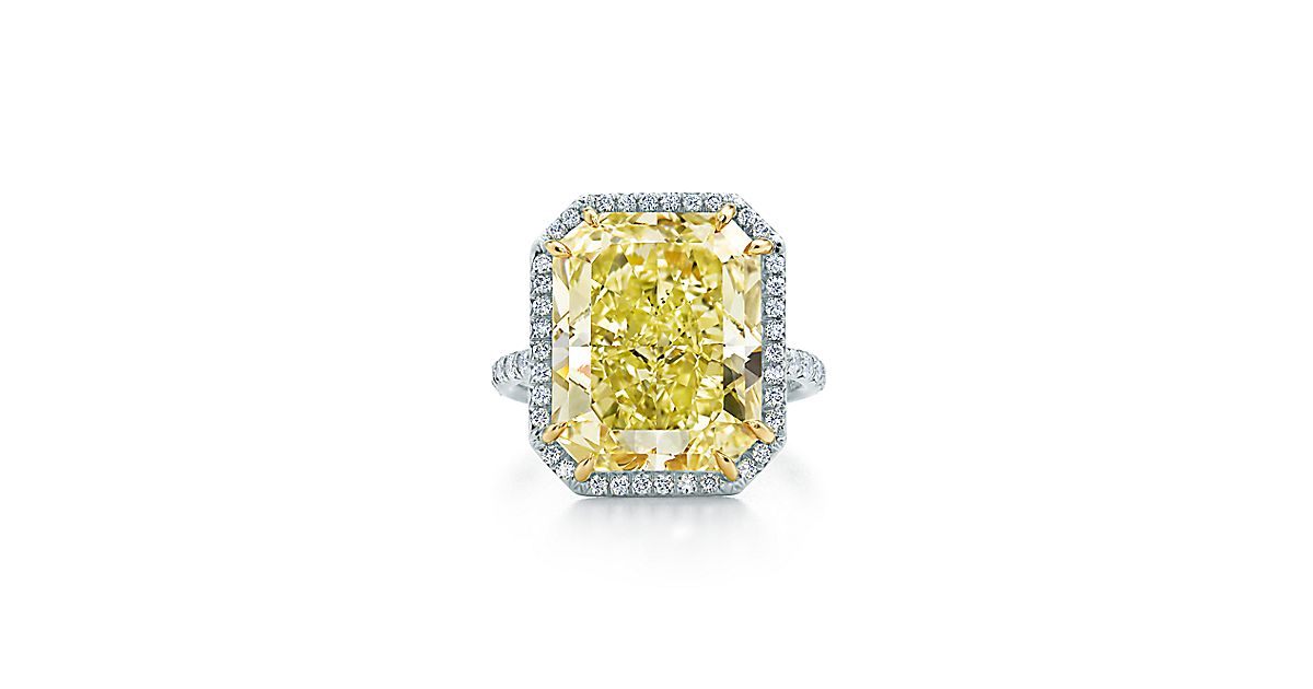 Rectangular Fancy Intense Yellow diamond ring in platinum and 18k gold