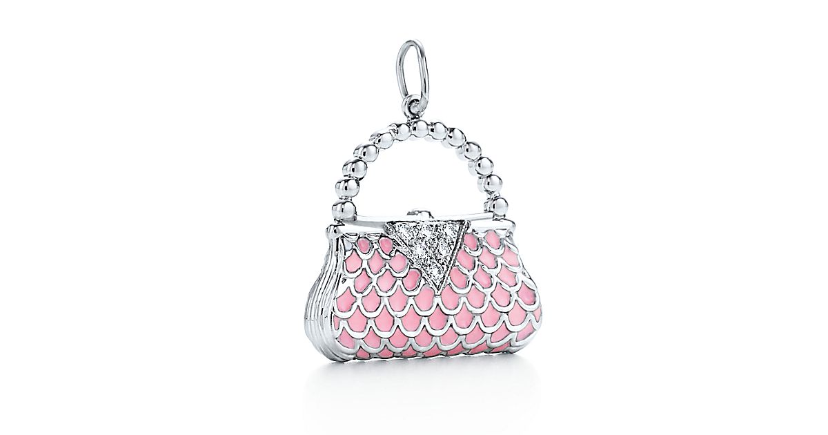 Handbag charm with diamonds and pink enamel finish in platinum