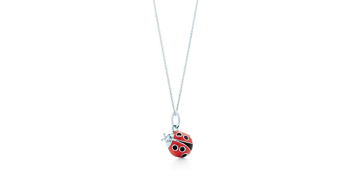 Ladybug charm in silver with red and black enamel finish on a chain, small. | Tiffany & Co.