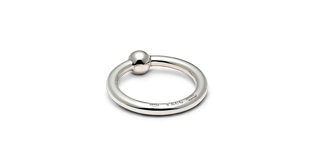 Tiffany 1837™ teething ring rattle in sterling silver. Tiffany & Co.