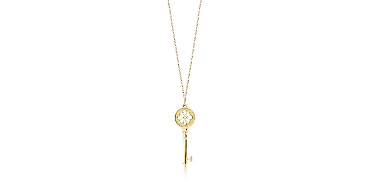 Tiffany Keys knot key pendant in 18k gold on a chain. Tiffany & Co.