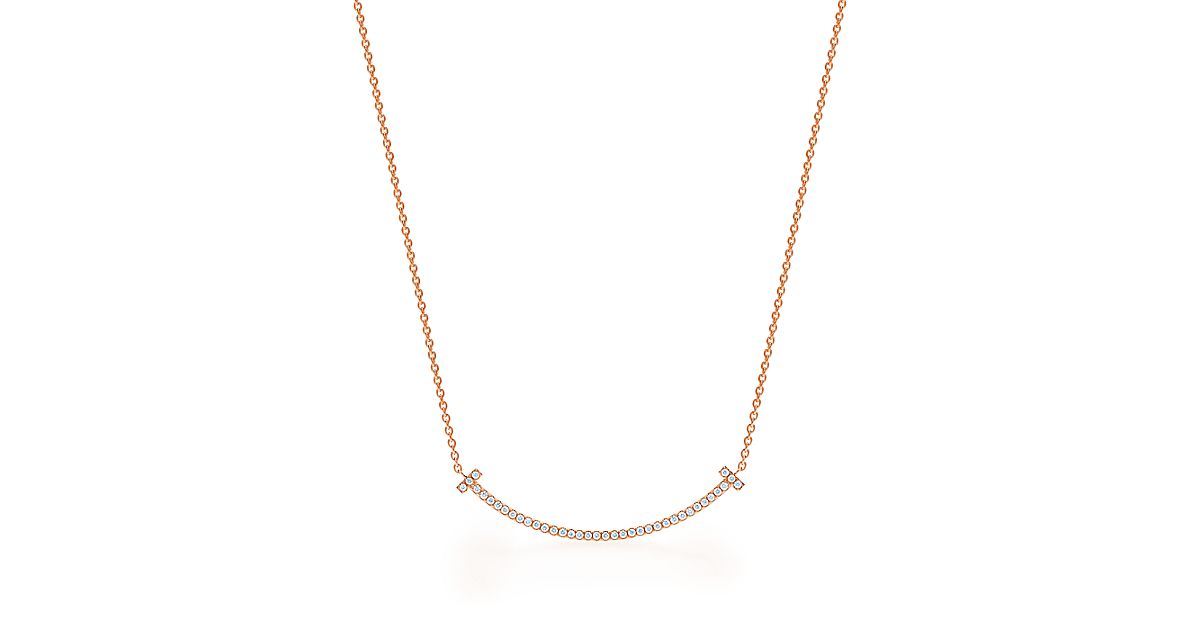 Tiffany T smile pendant in 18k rose gold with diamonds, mini. | Tiffany