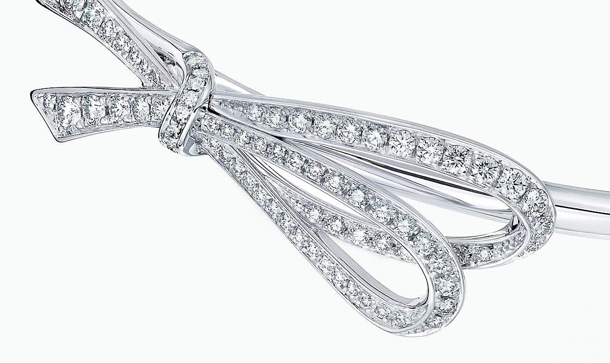 Tiffany Bow ribbon ring with round brilliant diamonds and aquamarine