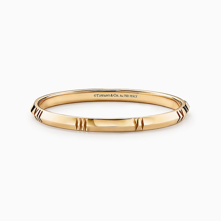 Tiffany & Co 18K Gold 5-Charm Link Bracelet Golden Metal ref.1025347 - Joli  Closet