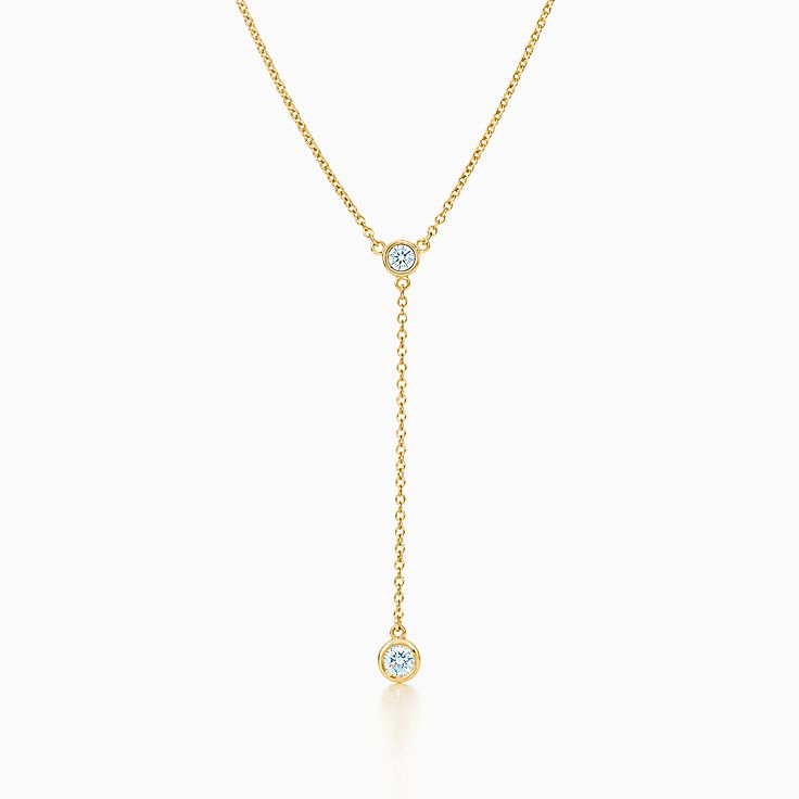 Gold necklace with a on sale diamond