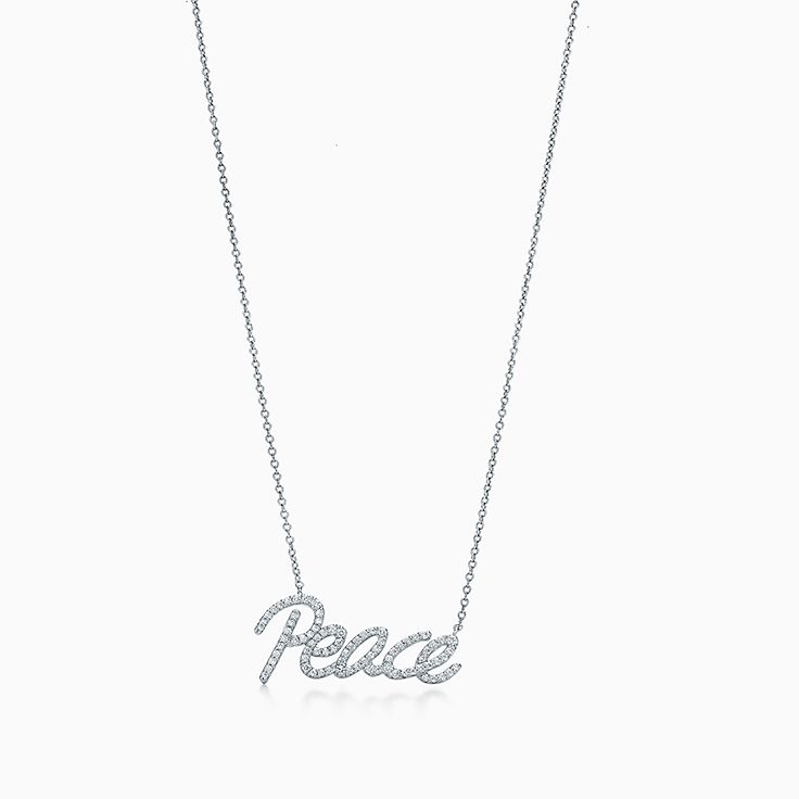 Paloma's Graffiti peace pendant in 18k white gold with diamonds