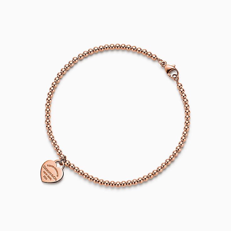 Return to Tiffany™:Brazalete con cuentas y placa estilo corazón mini