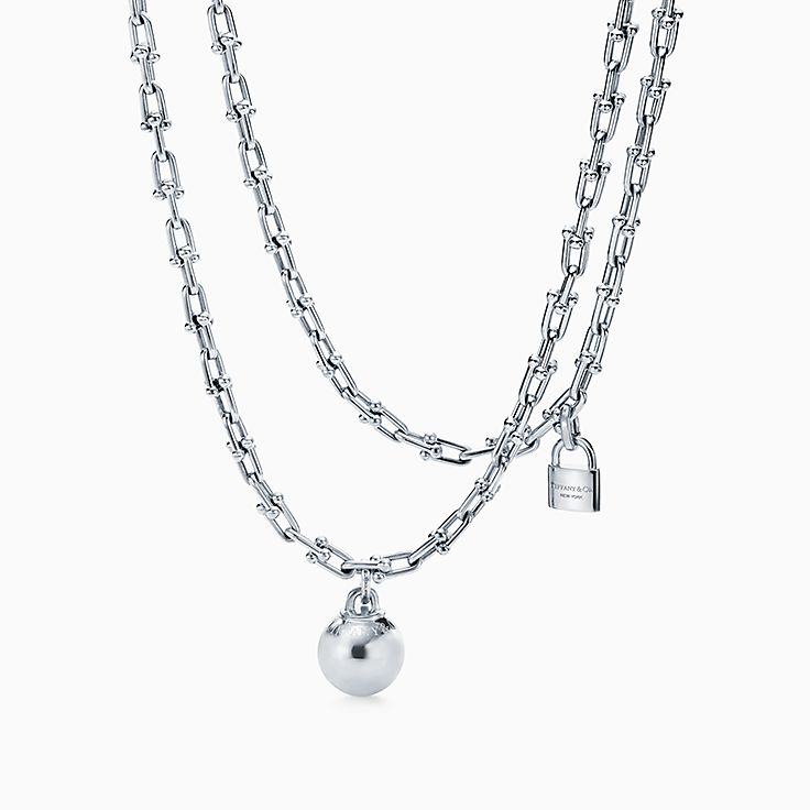 Tiffany Notes alphabet disc charm in silver on a chain. Letters A-Z  available. | Tiffany & Co.