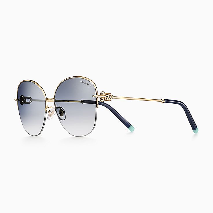 Solaires Tiffany HardWear en m tal dor p le et verres bleus