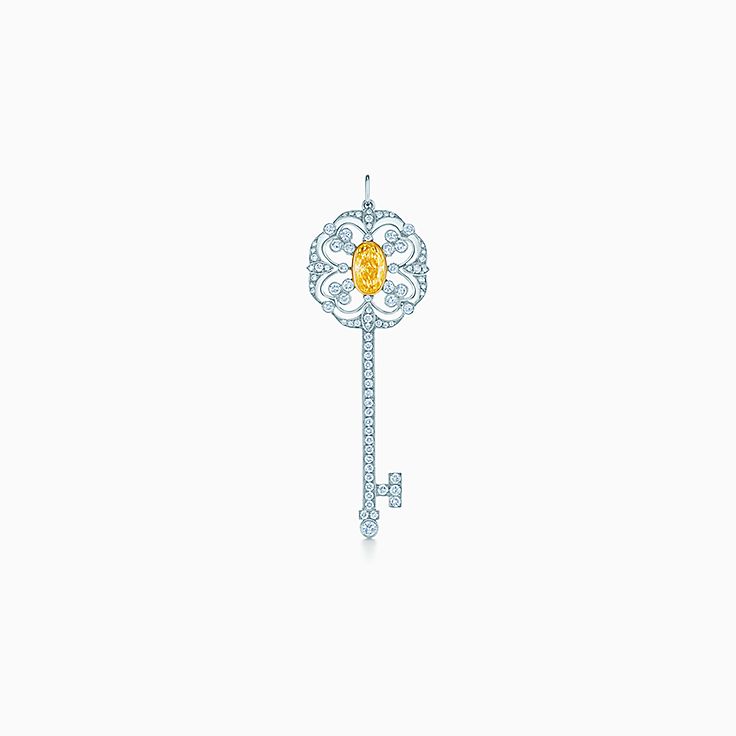 Tiffany & Co. - Tiffany Yellow Diamonds unleash an electrifying color and  sparkle. Pendant with a 24.82-carat fancy intense Tiffany Yellow Diamond in  18k gold and white diamonds in platinum.