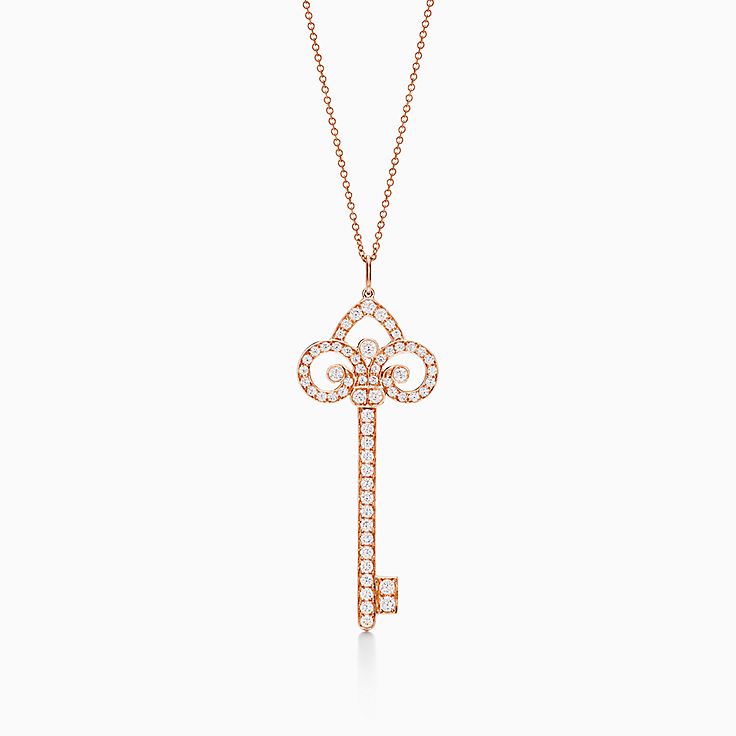 Tiffany Keys knot key pendant in 18k white gold with diamonds on a chain.