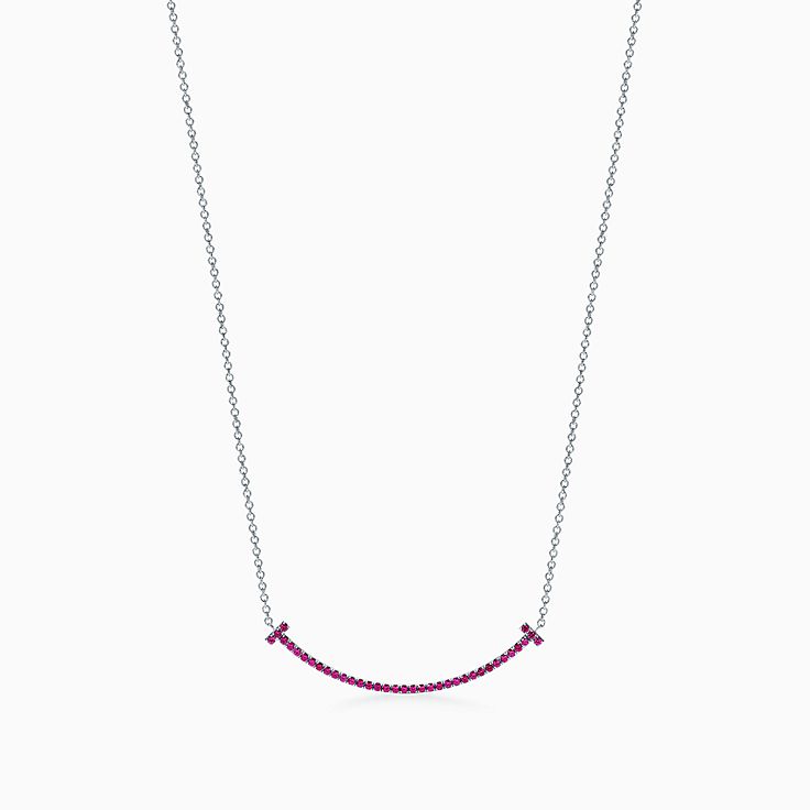 Tiffany T pendant in 18k gold with a baguette diamond. | Tiffany & Co.