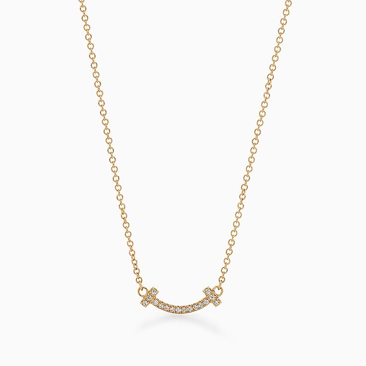 Tiffany T smile pendant in 18k gold with diamonds, mini. | Tiffany 