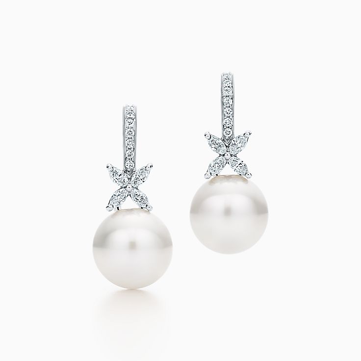 Dangling pearl earrings with on sale diamonds