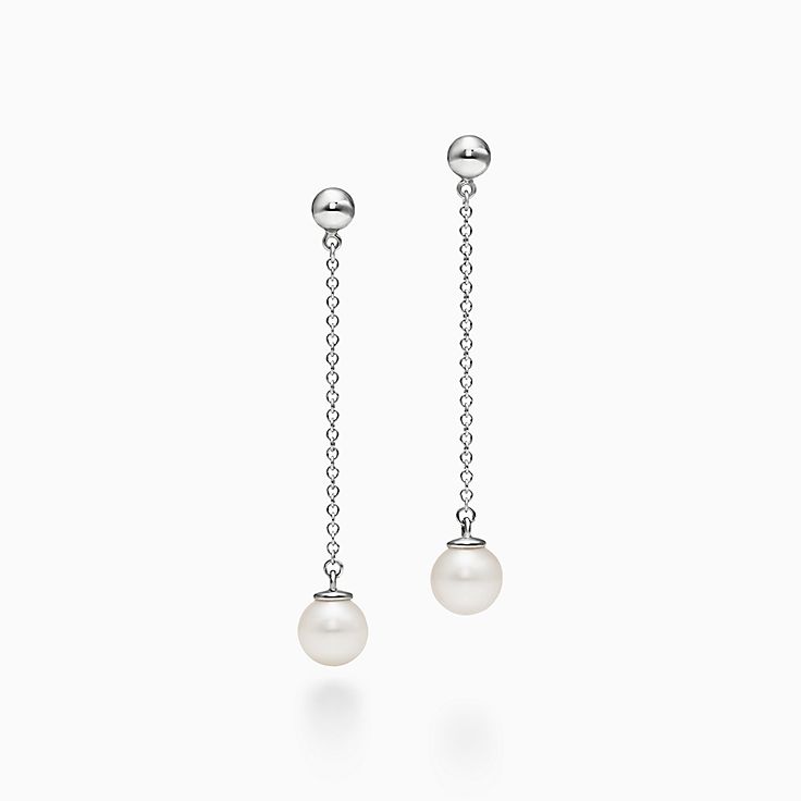 Ziegfeld Collection pearl necklace with a silver clasp and decorative tag,  6-7 mm.