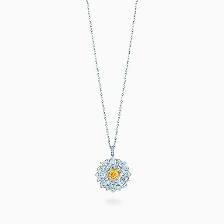 Daisy pendant in platinum and 18k gold 