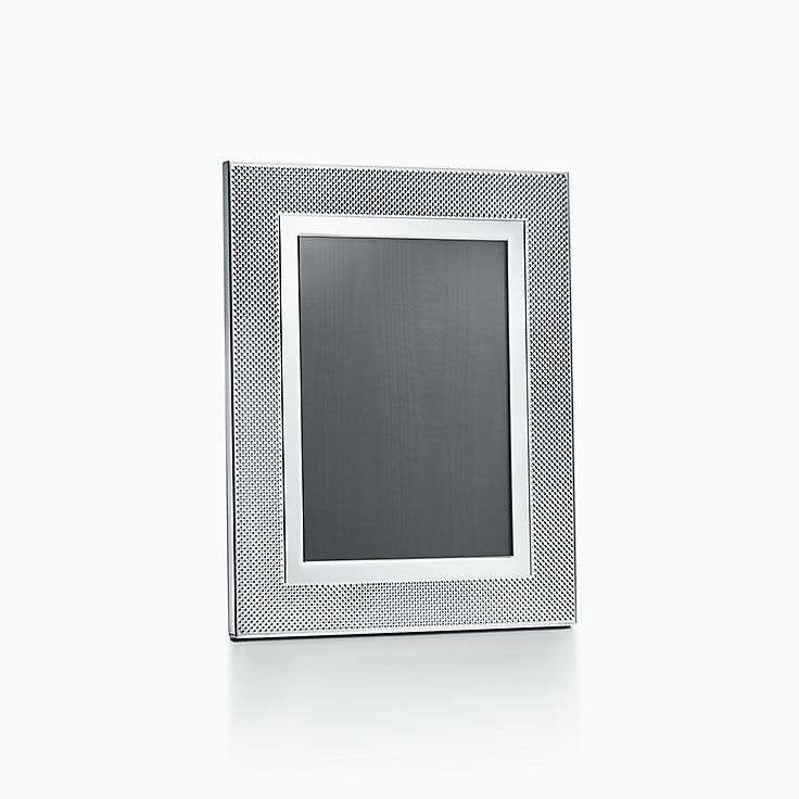Rectangular frame in sterling silver, size 4 x 6 with window opening.