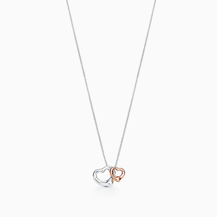 Elsa Peretti™ Open Heart pendant in silver and 18k rose gold 