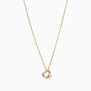 Elsa Peretti™:Open Heart Pendant in 18k Gold with Diamonds