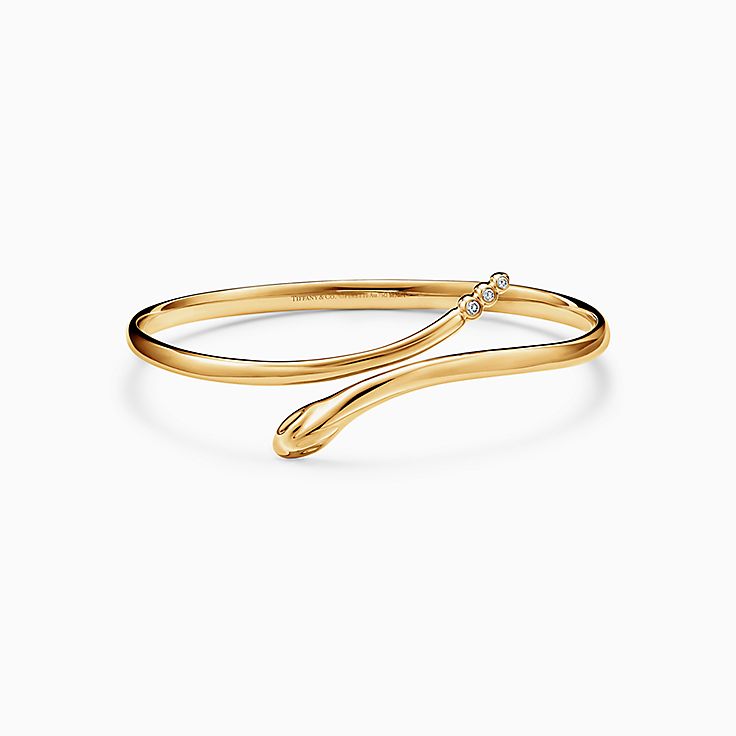Elsa Peretti® Snake Bangle in Yellow Gold with Diamonds | Tiffany
