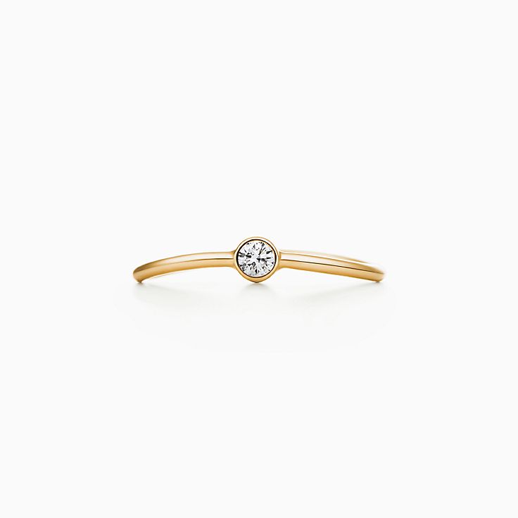Elsa Peretti® Diamond Hoop single-row bangle in 18k rose gold with diamonds.  | Tiffany & Co.