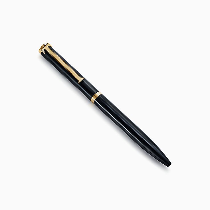 Elsa Peretti® retractable ballpoint pen in black lacquer finish over brass.