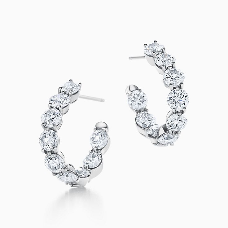 Inside out hoop earrings in platinum with diamonds. Tiffany Co