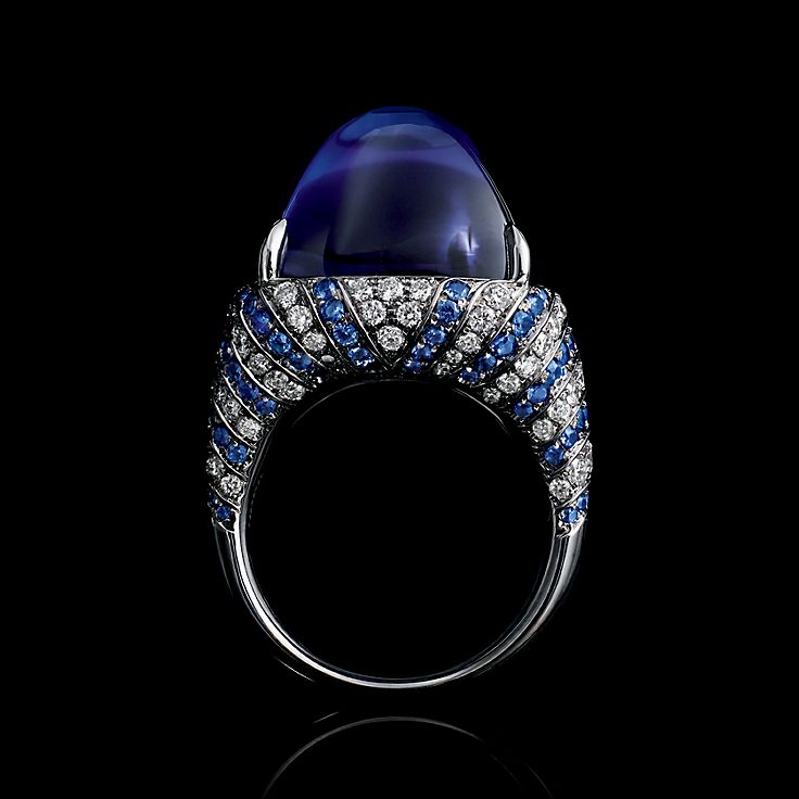 Bague en platine avec une tanzanite de 32 27 ct des diamants et