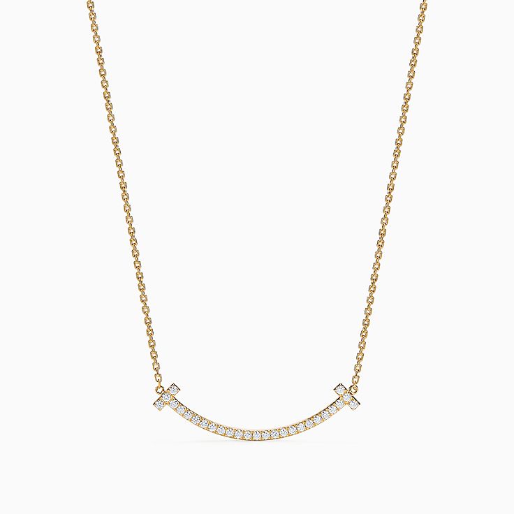 Tiffany T medium smile pendant in 18k gold with diamonds