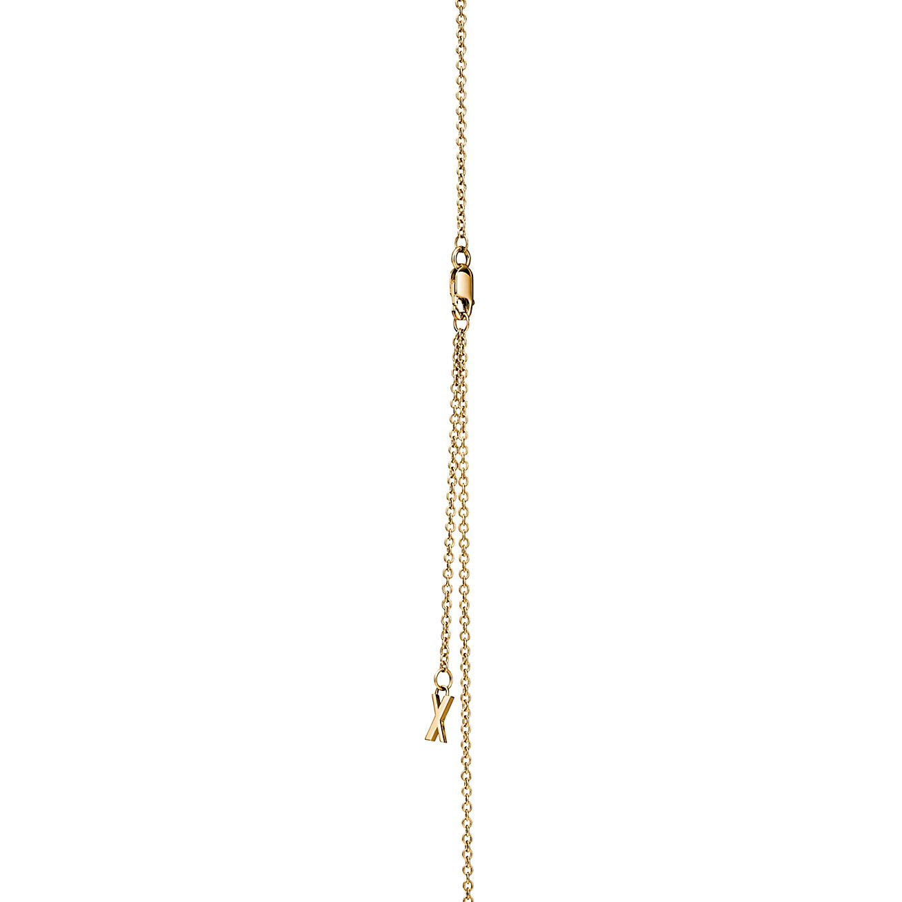 Atlas® X Closed Interlocking Pendant in Yellow Gold | Tiffany & Co.
