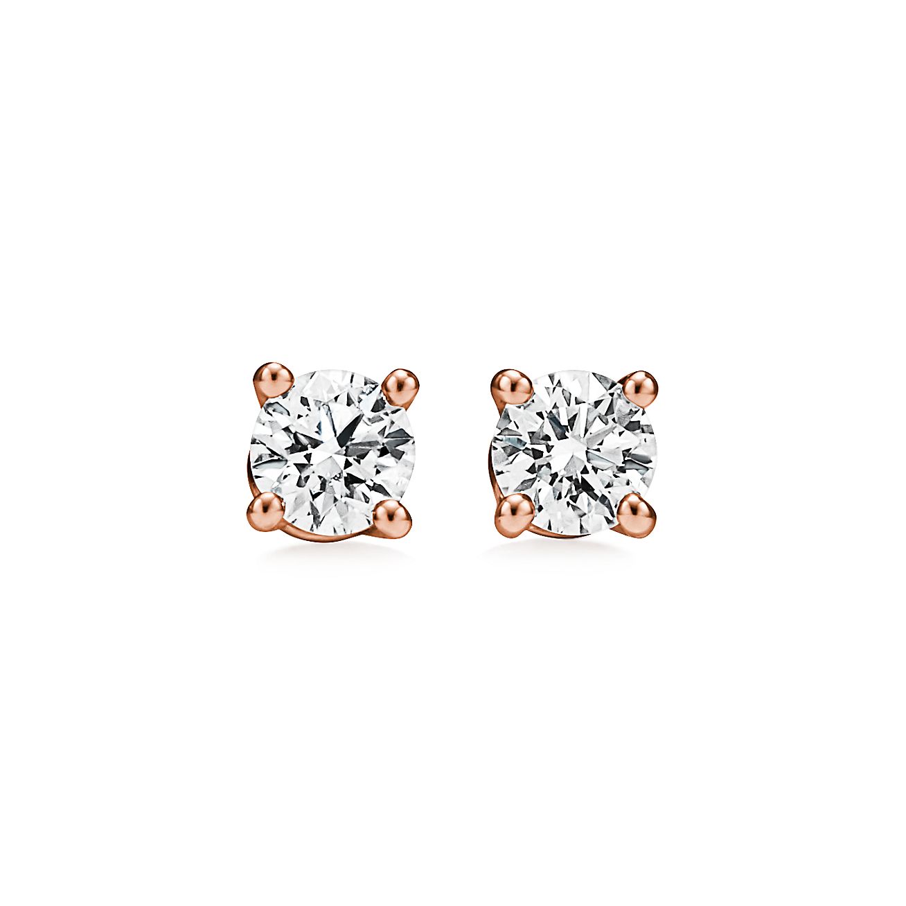 Clous d’oreilles ornés d’un diamant solitaire Tiffany, en or rose 18 carats | Tiffany & Co.