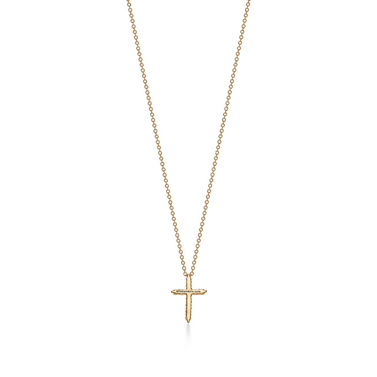 Cross pendant in 18k gold with diamonds 