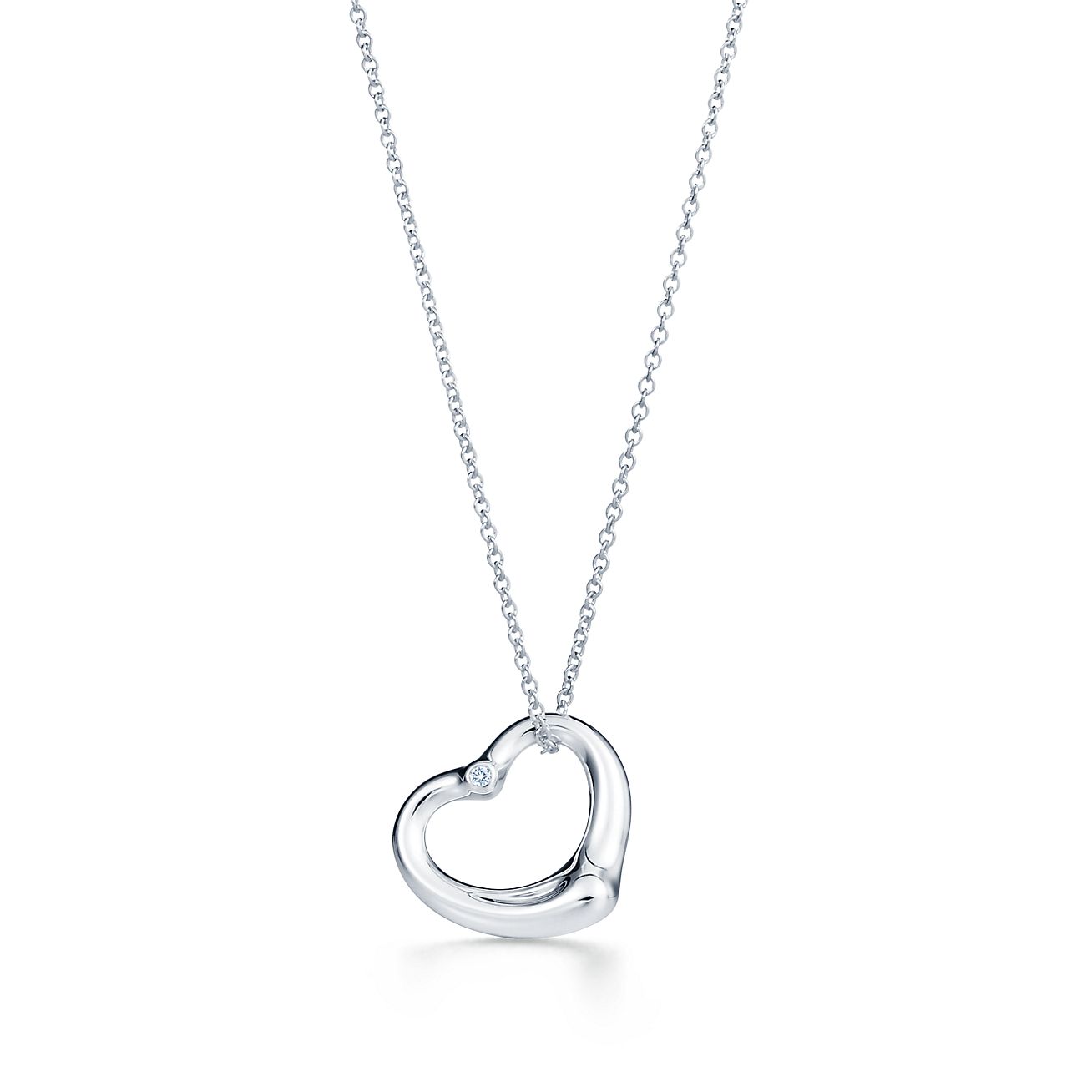 Elsa Peretti® Open Heart pendant in silver with diamonds. More sizes available.